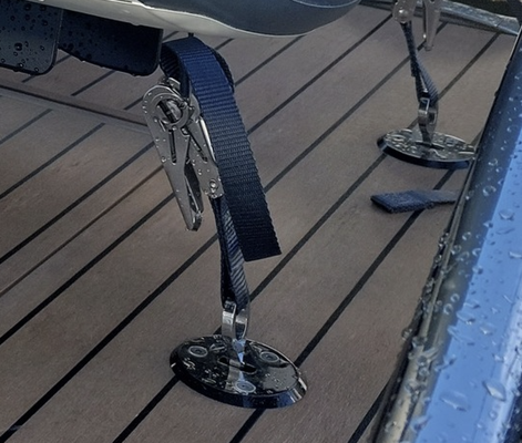 Low profile tender & jetski tie down kit