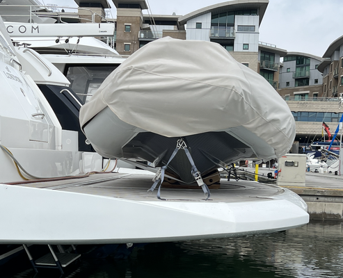 Low profile tender & jetski tie down kit