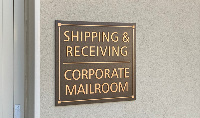 Shipping & Receiving ADA Sign by Landmark Signs Inc. 