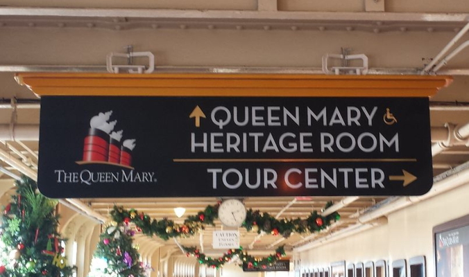 Queen Mary Directional Sign by Landmark Signs Inc.