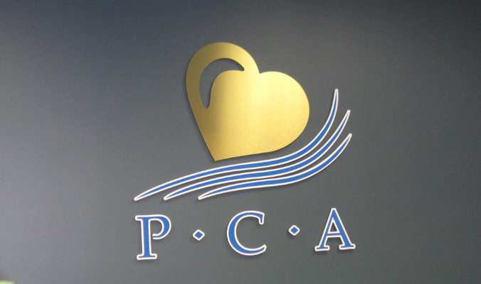 P.C.A. Lobby Signs by Landmark Signs Inc