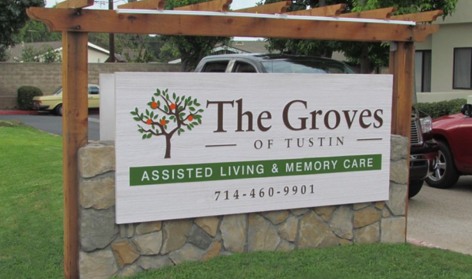 The Groves Wood Sign by Landmark Signs Inc.