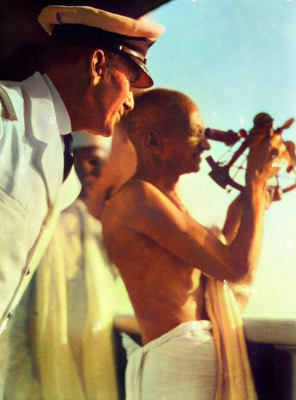 Captain Morton with Mahatma Gandhi on board the SS Rajputana. Image coloured by A. Zois.
