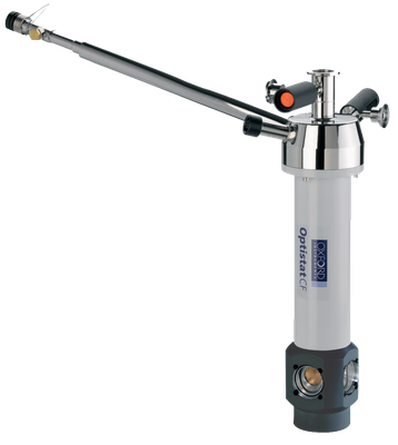 A 4 K helium-flow, top-loading cryostat with sample in static exchange gas.