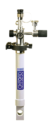 A 4 K helium-flow, sample-in-vacuum cryostat system with a narrow rectangular tail, designed for optical microscopy.