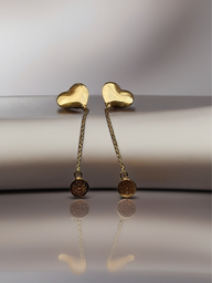 MOKOŠEV luxury jewelry, delicate gold heart earrings with fine chains on a soft, reflective surface.