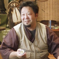 熊の油を語る川の達人