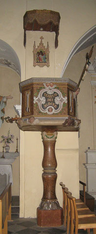 Omessa - Chaire baroque - A la base de la cuve sont sculptés les symboles du Tétramorphe