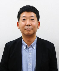 間野弘之氏