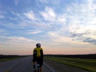 Cyclist riding during a sunrise. Click image to go to results page