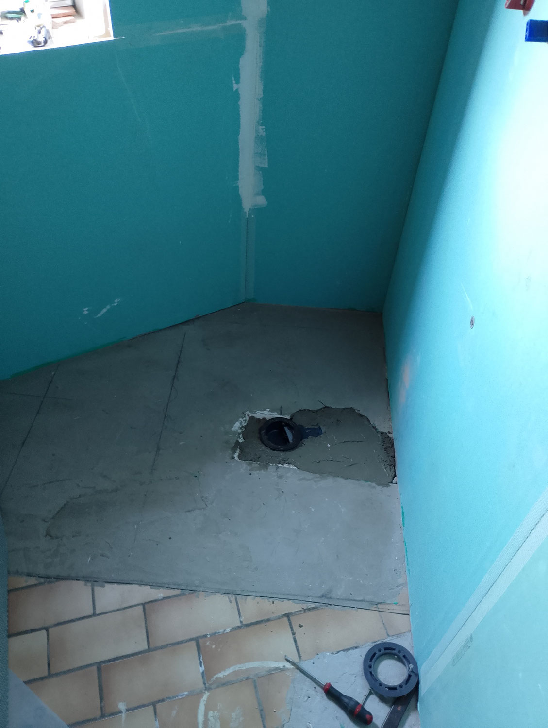 Ragréage et scellement de la bonde douche