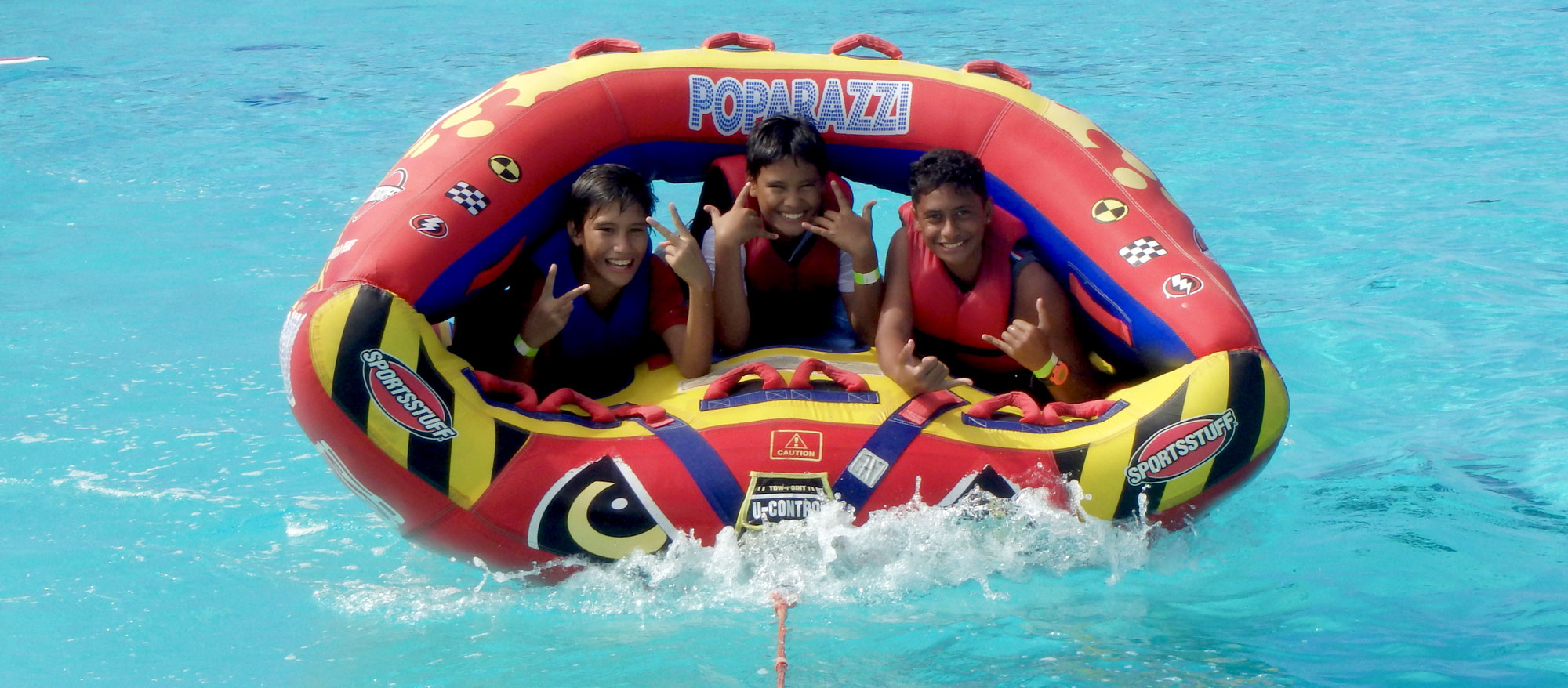 Towable tubing behind a boat in Moorea Moorea Watersport Waverunner