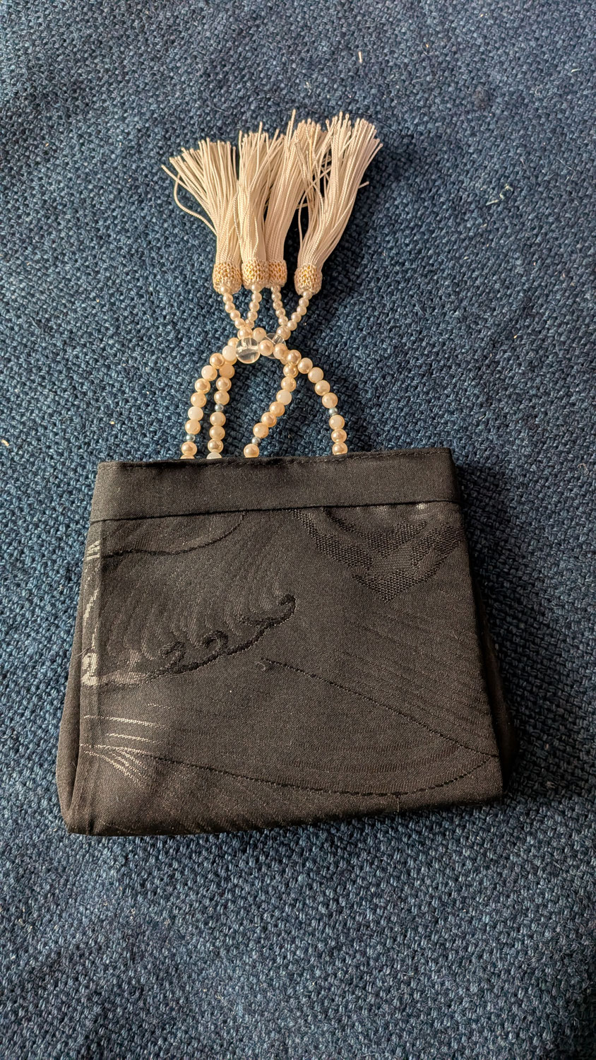 Remaking a beaded accessory pouch from a black belt