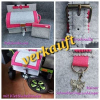 https://www.schreib-naehwerkstatt.de/andrea-s-nähwerkstatt/rollstuhl-taschen/#cc-m-product-12028263274 (Rollstuhltasche für die Armlehne in hellgrau/pink)