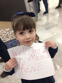 Isabella holding up my welcome sign: Welcome 2 Mexico Irene