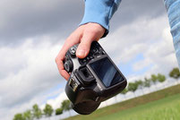 man holding camera