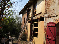 Façade en ossature bois et bardage en cours de travaux