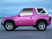 Vitara con una cappotta bianca