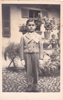 Beppe at 8, dressed for Cresima