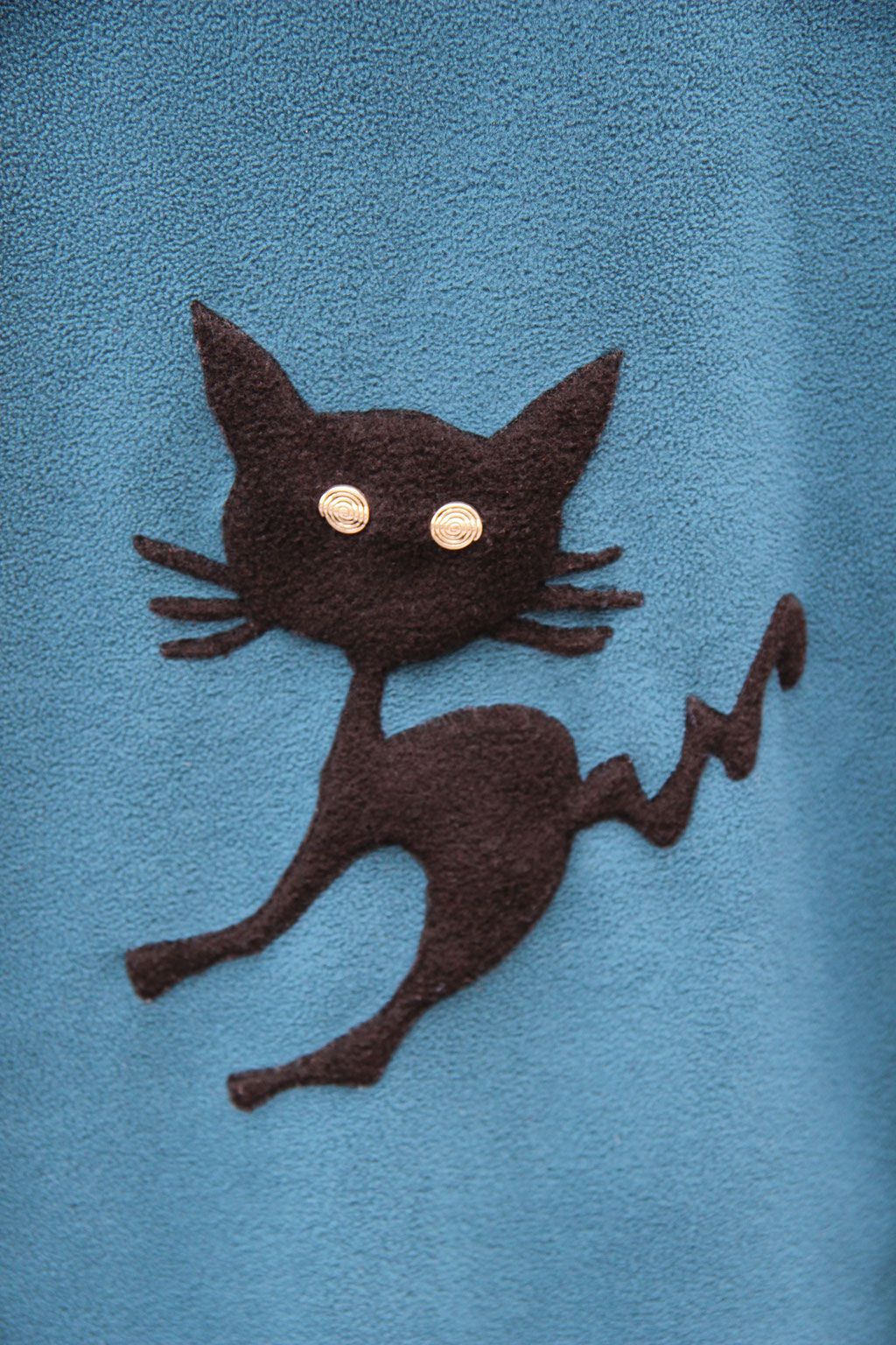 Poncho/Cape "Chat foufou" (Détail)