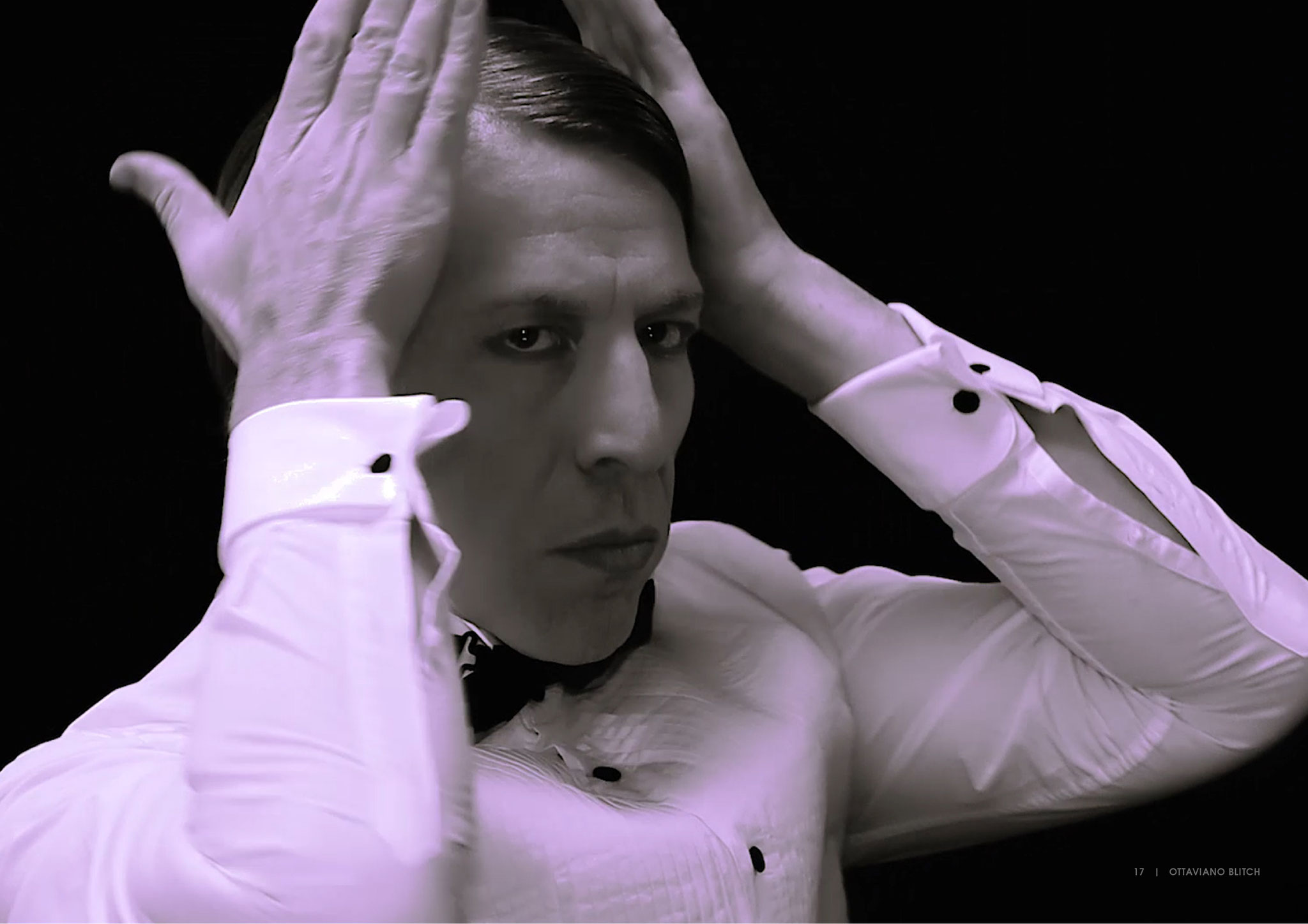 Ottaviano Blitch, actor and performer, sensual artistic portrait with hands behind his head in a white shirt, attore performer ritratto artistico