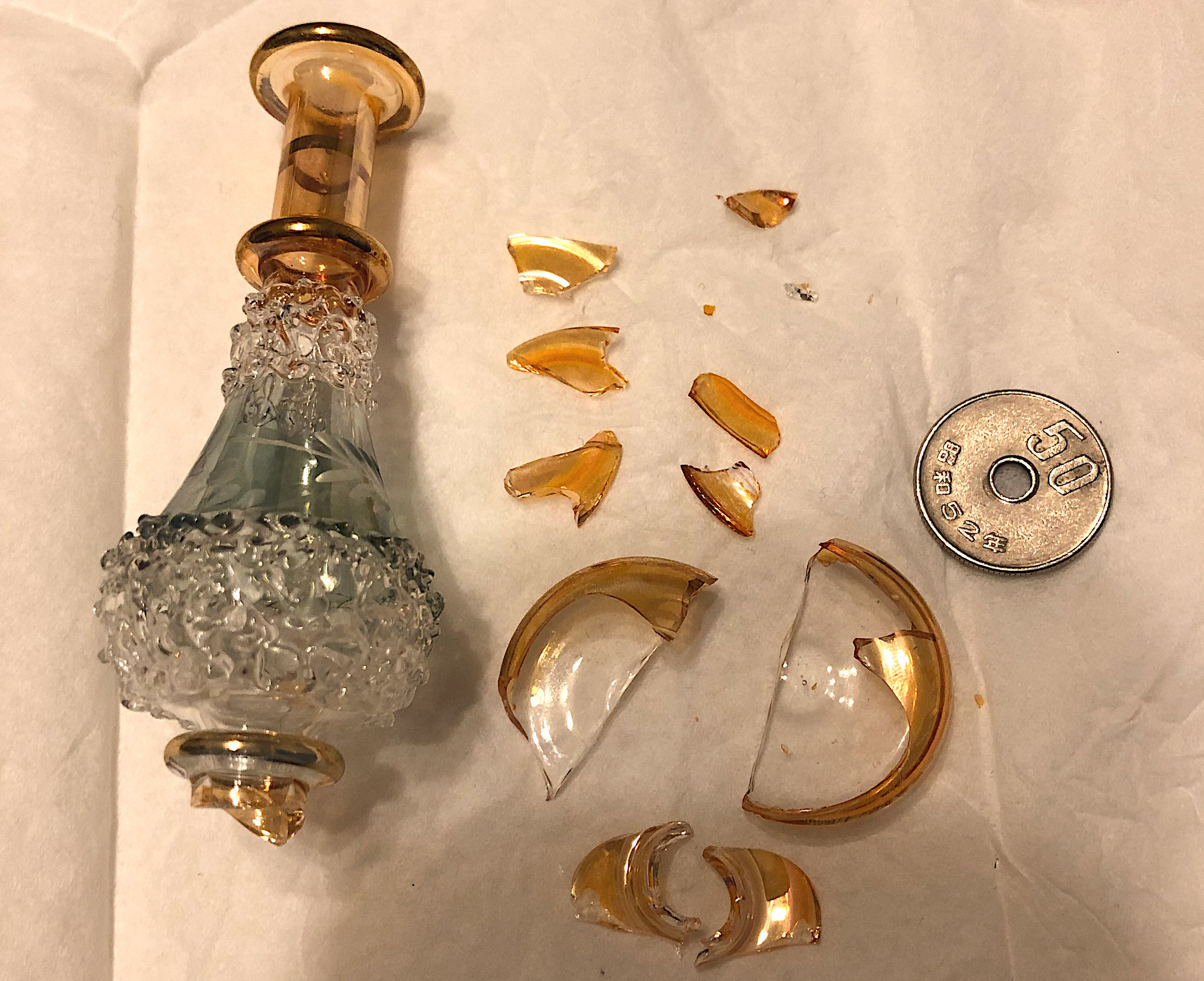 香水入れ破損 →