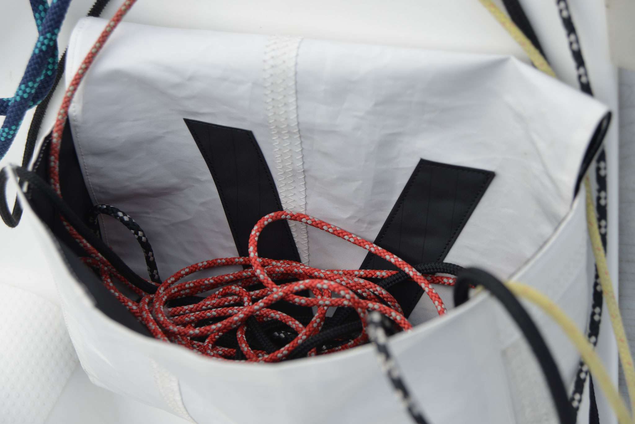 can be used closed with the side openings or open while sailing
