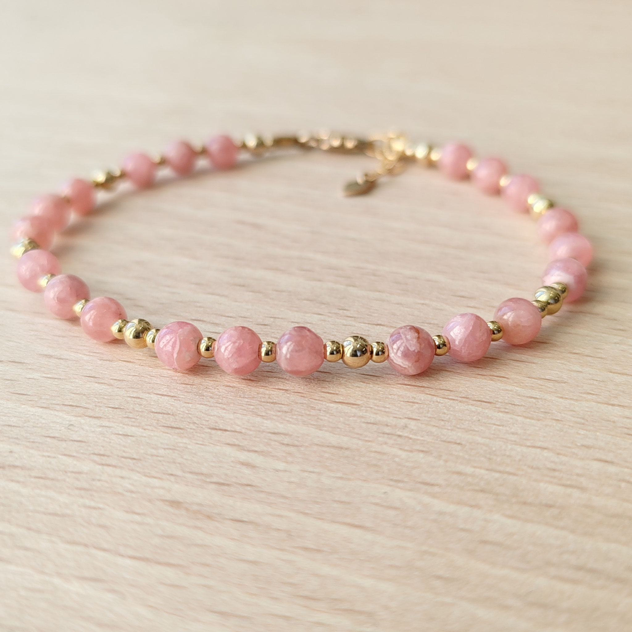 Rhodochrosite/goldfilled