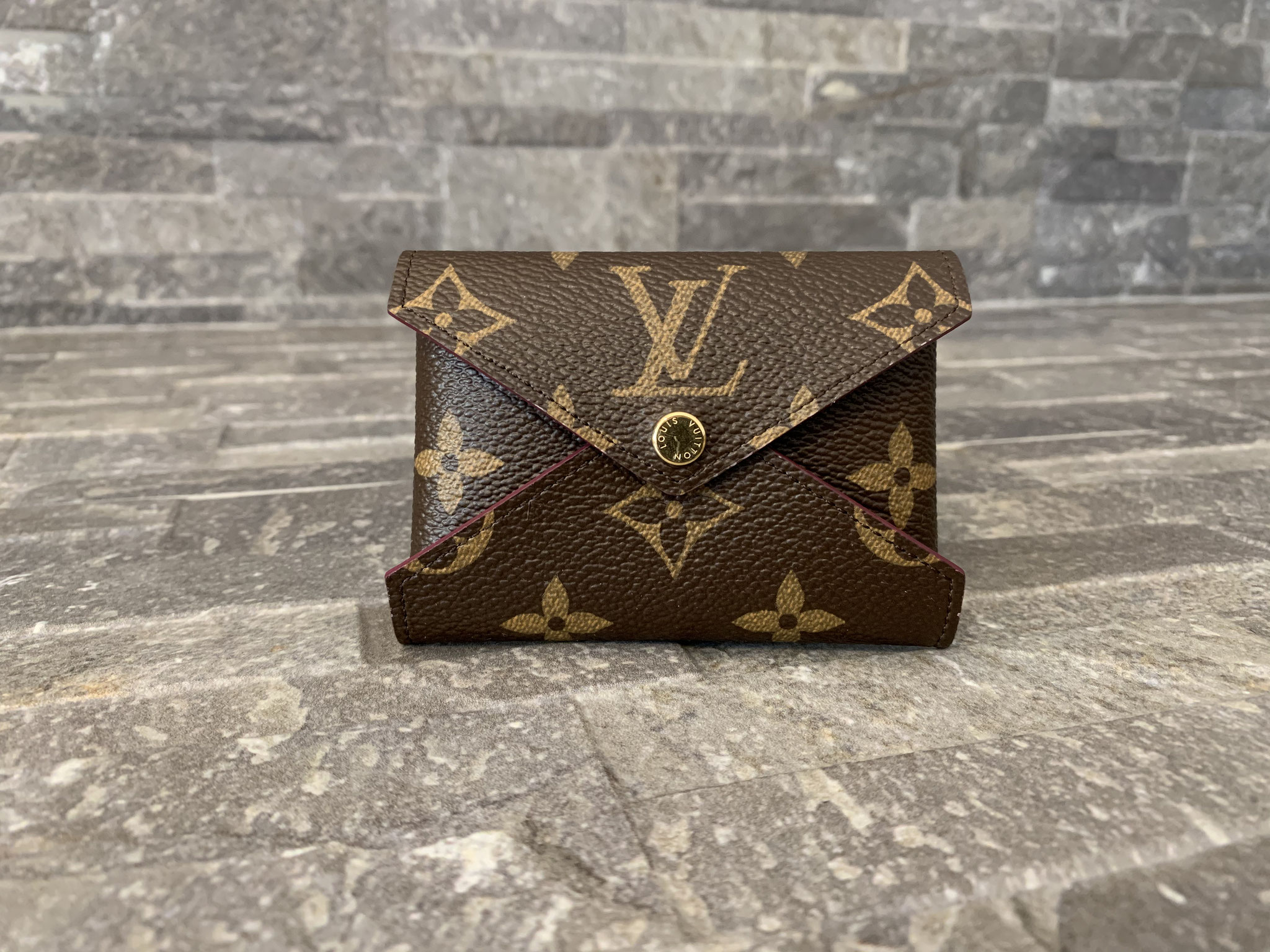 Preloved Louis Vuitton Kirigami Monogram Pouch SN4129 013023 – KimmieBBags  LLC