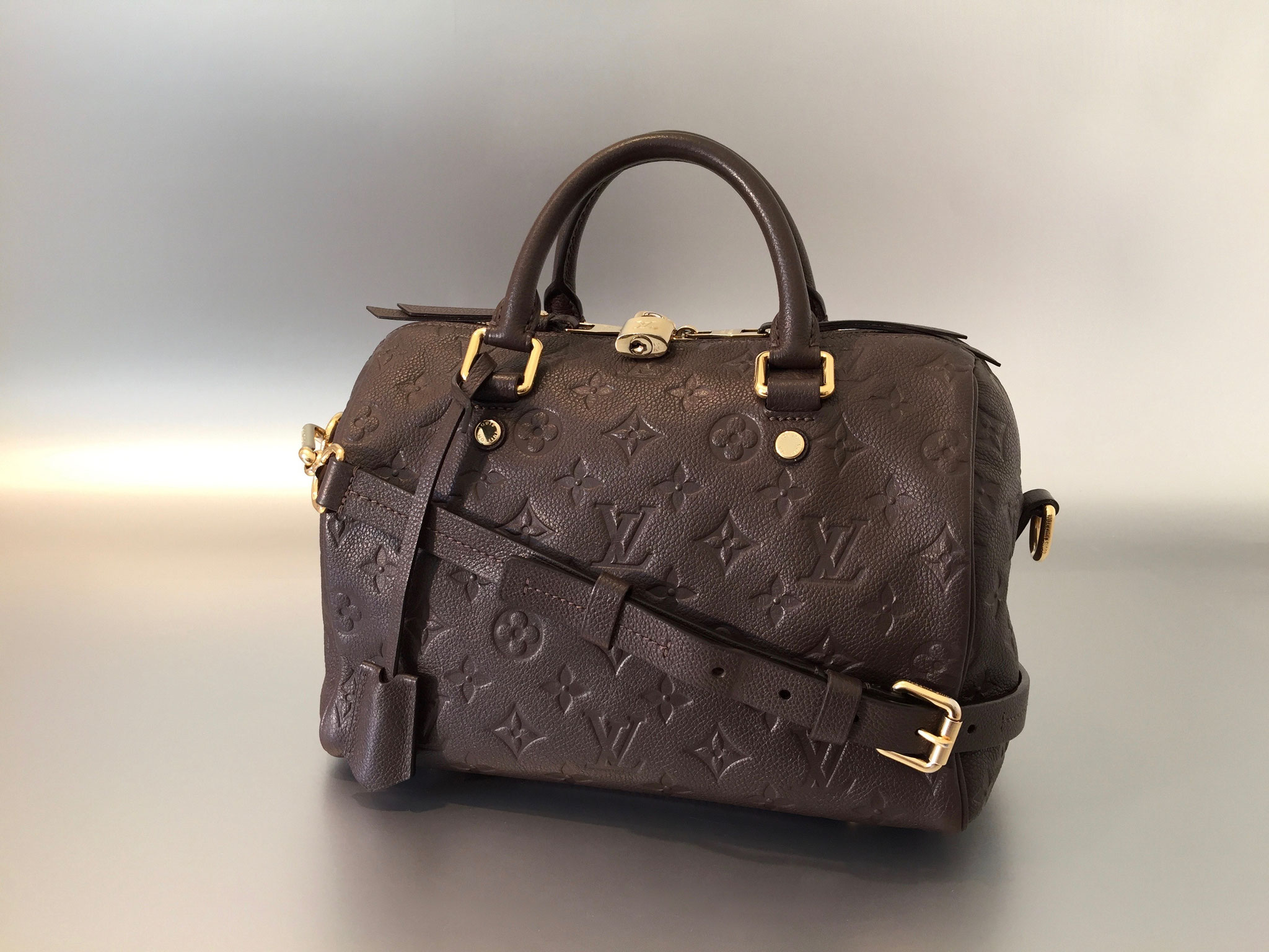 Louis Vuitton Monogram Empreinte Speedy Bandouliere 25 in Terre Ankauf Verkauf Second Hand Designertaschen und Accessoires
