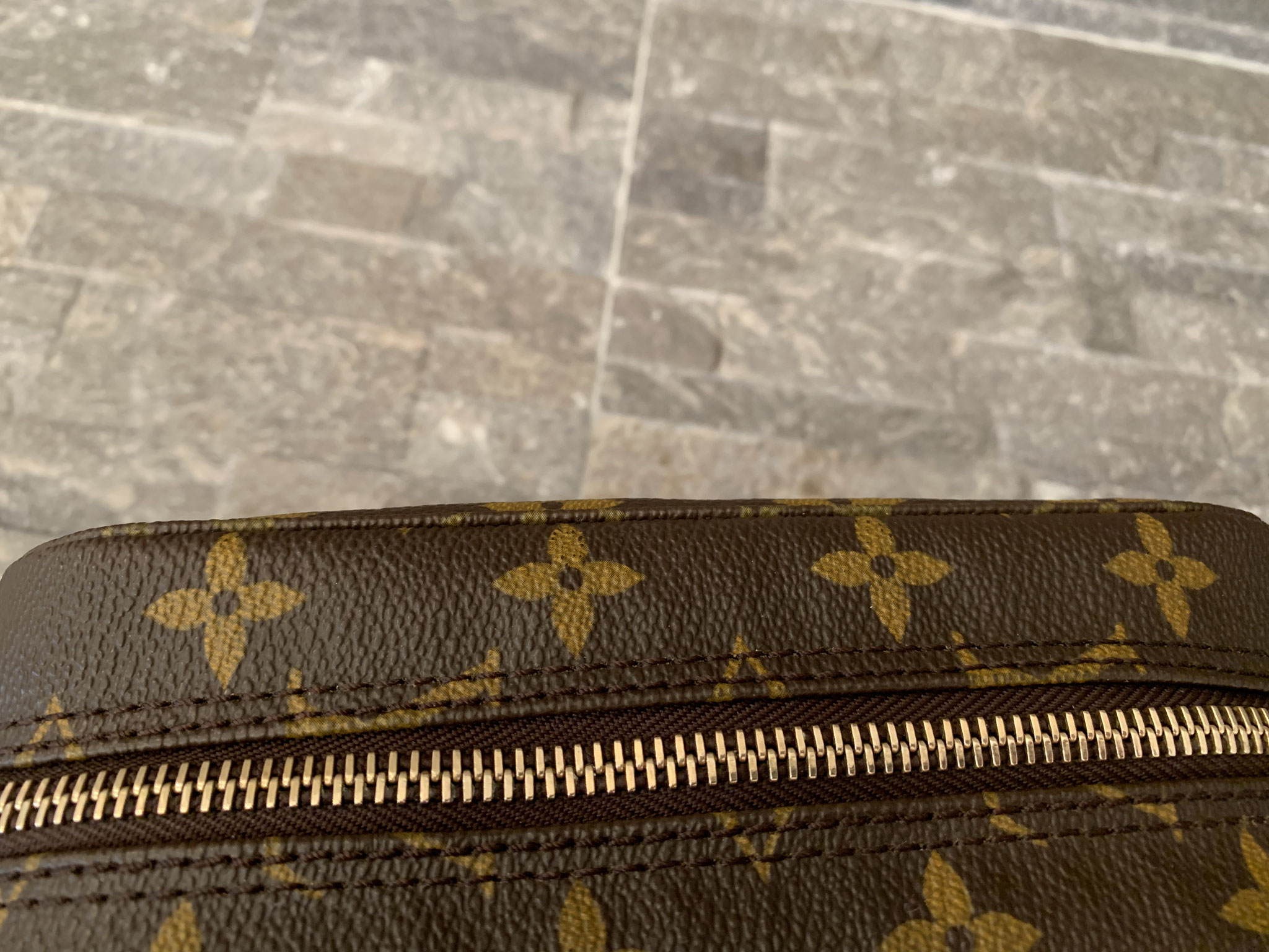 Trousse de toilette cloth vanity case Louis Vuitton Brown in Cloth -  37501189