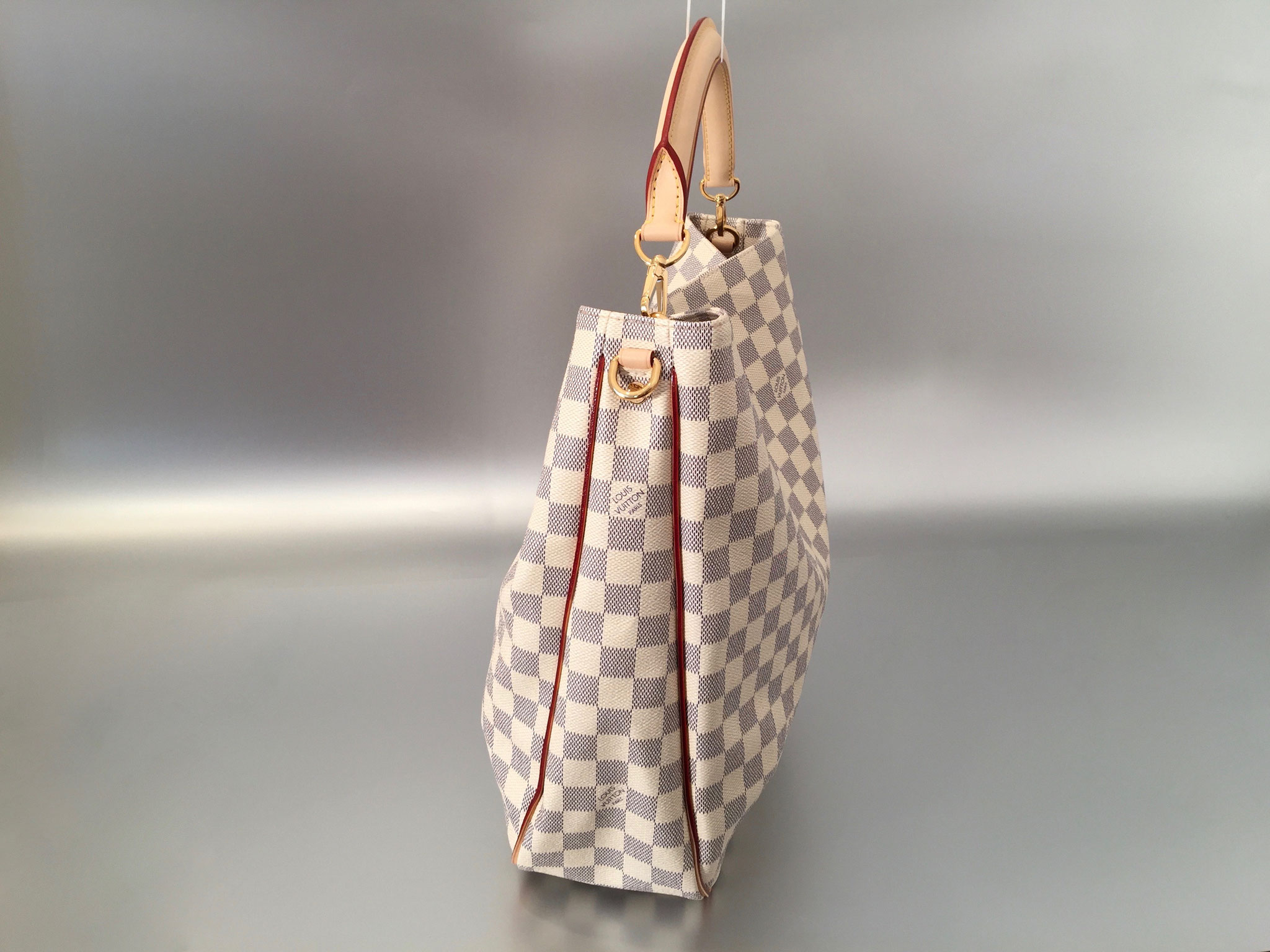 Lot - Louis Vuitton White Daumier Azur Soffi Bag