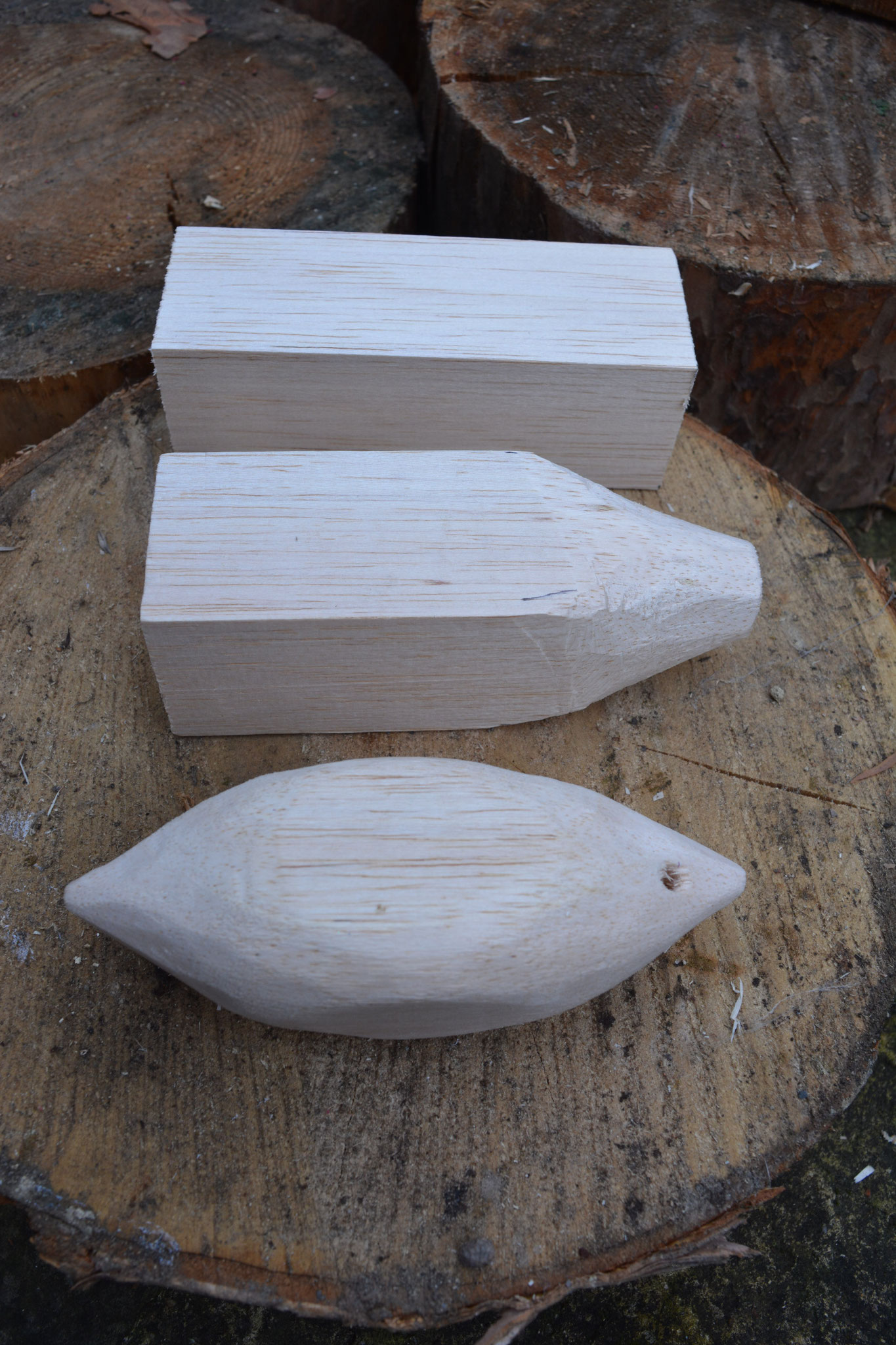 3 stages of the bauble whittling