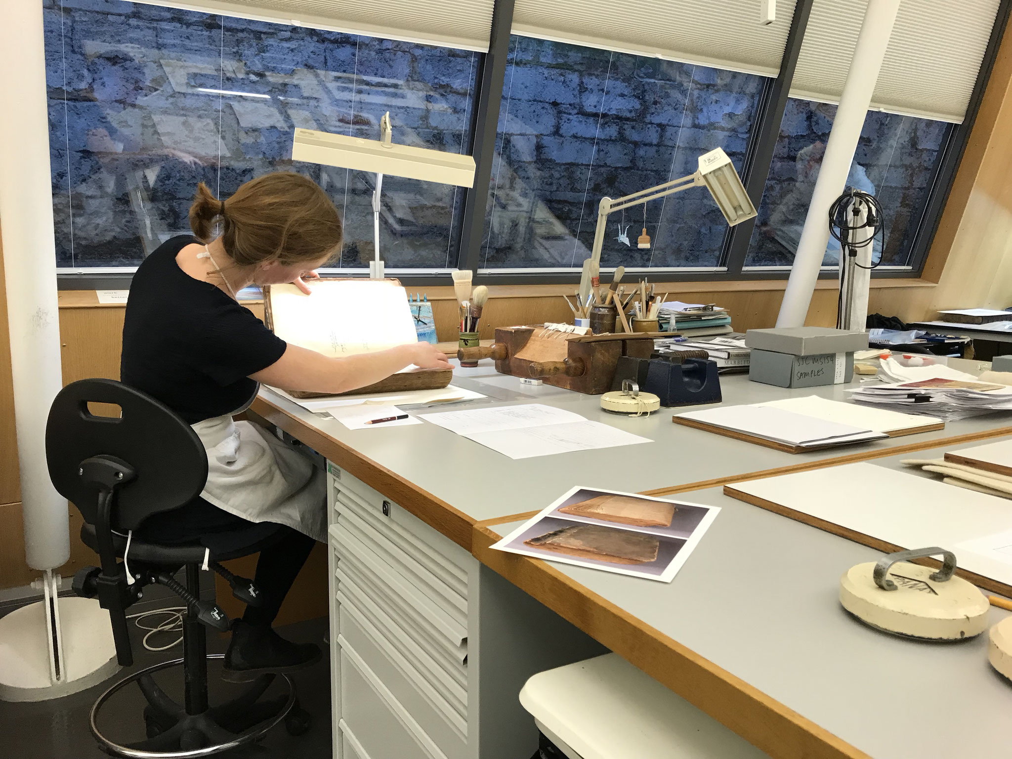 Conservator try to bring the book back in a good form