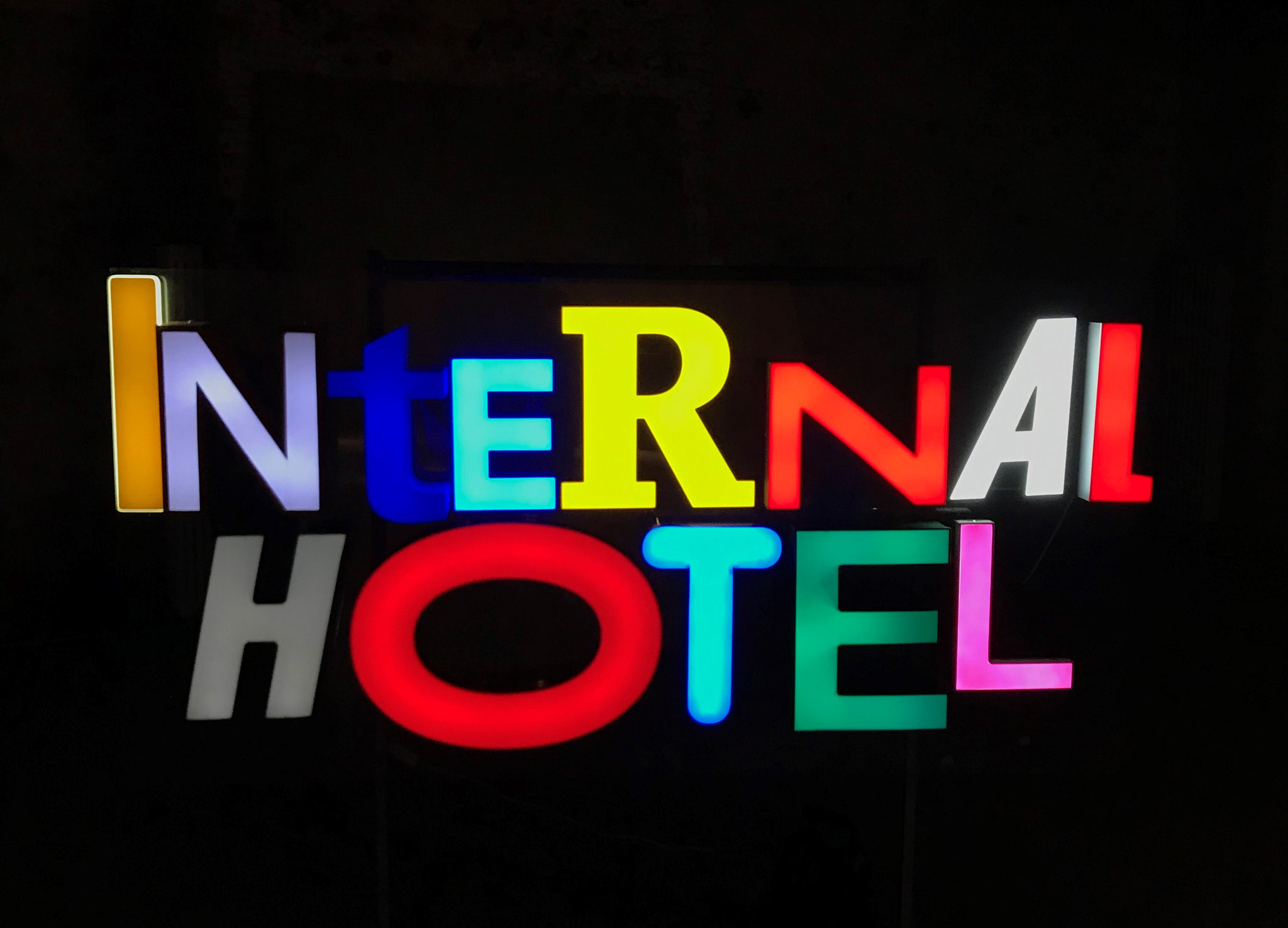 INTERNAL HOTEL, Vintage lighting letters on acrylic plate, 100 x 200 cm, 2019 (Installation view: Solo show INTERNAL HOTEL, Ho Gallery, Vienna, Austria / 2019)
