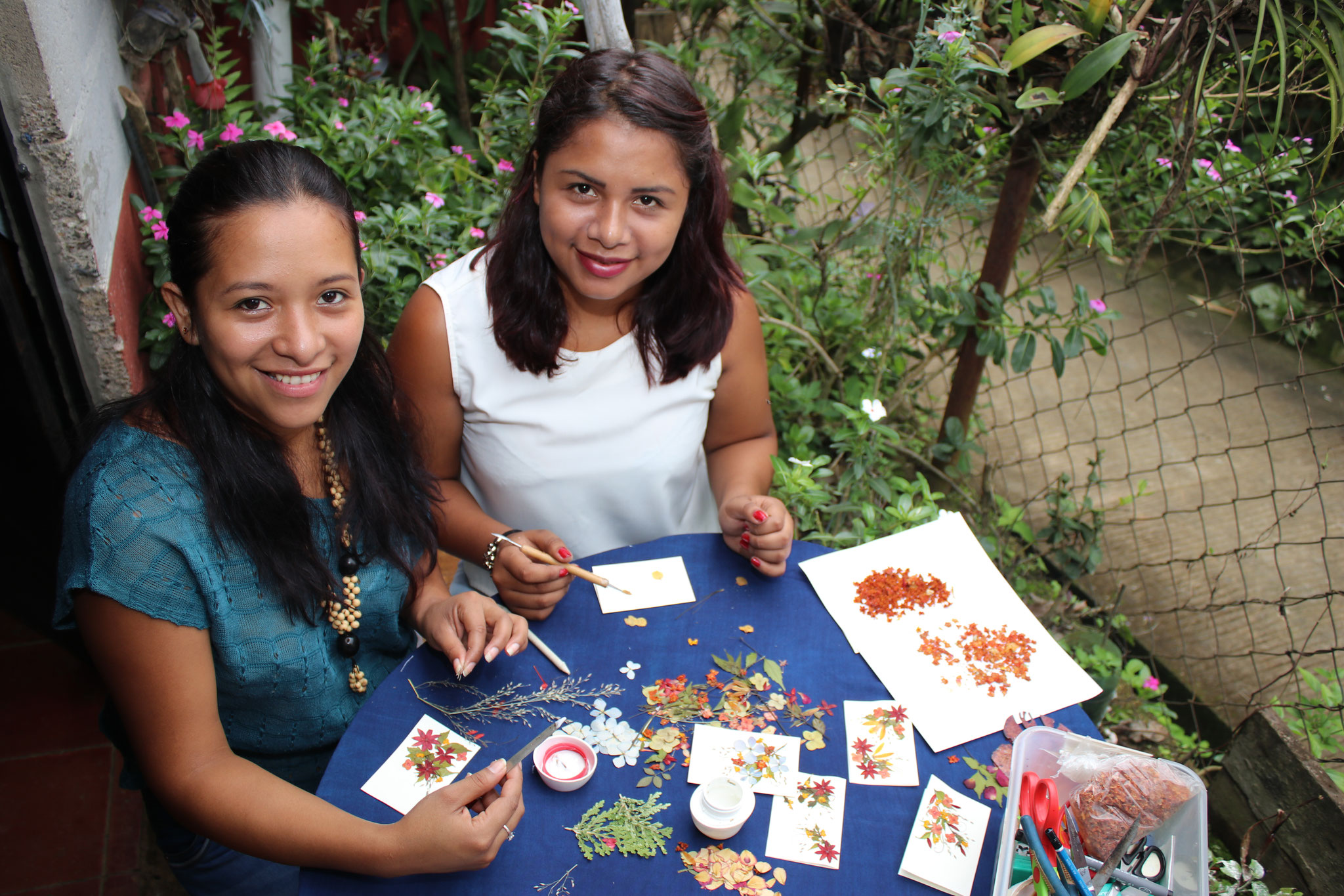 Noelia and Daniela create beautiful cards and pictures with flowers for their company Guanaquitas