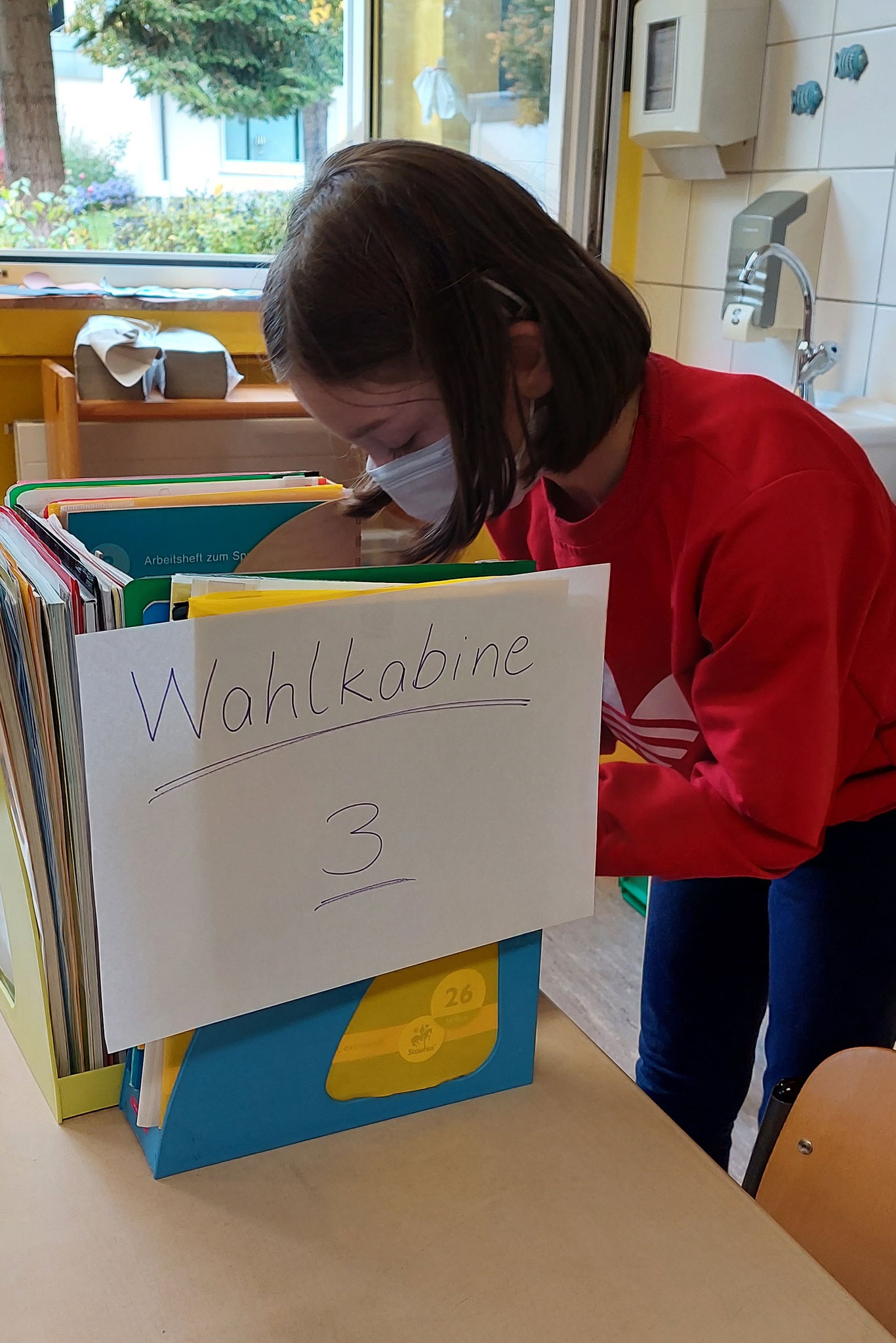 Stimmabgabe in der Wahlkabine