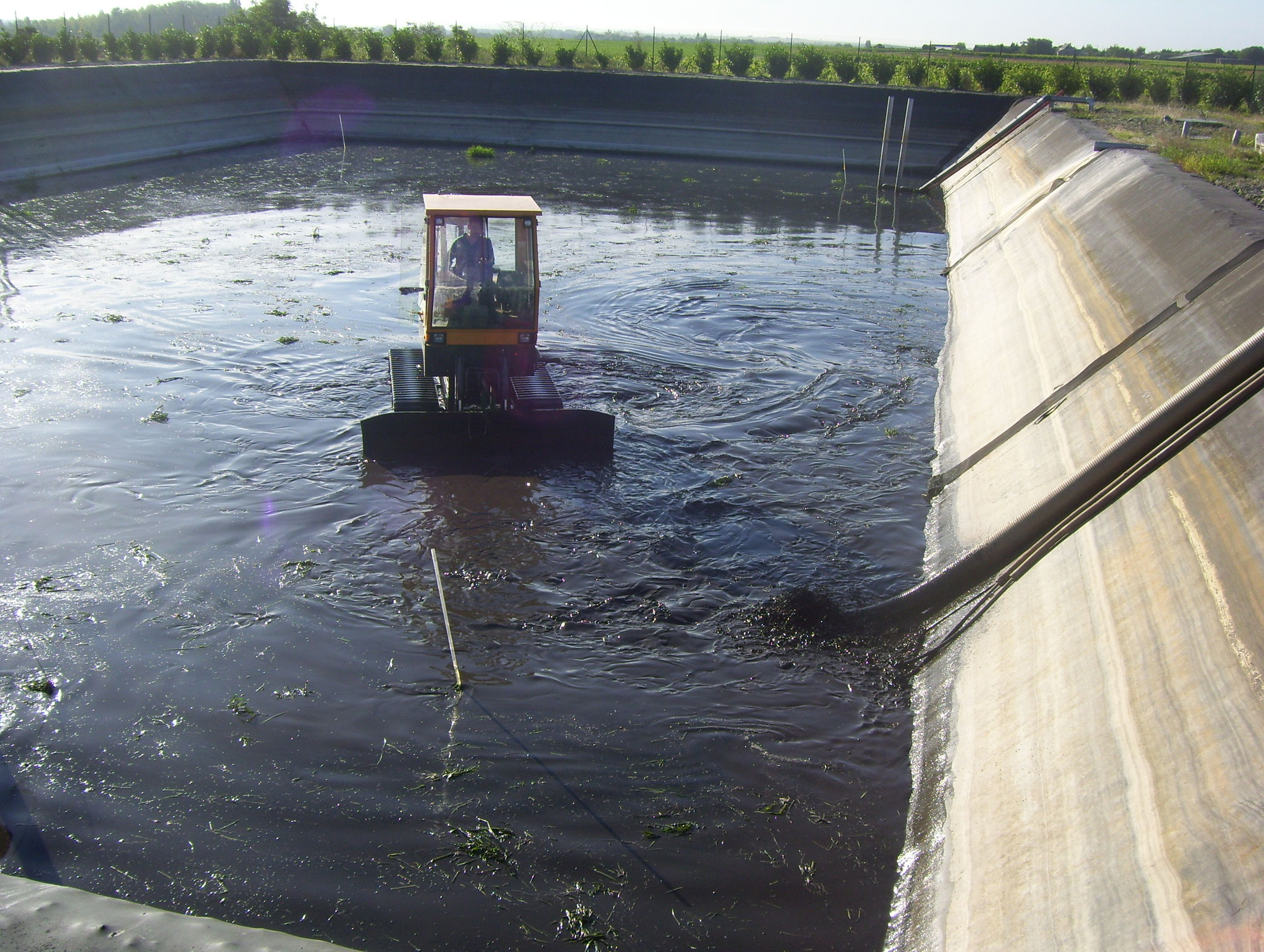 Curage de lagune sur bâche 