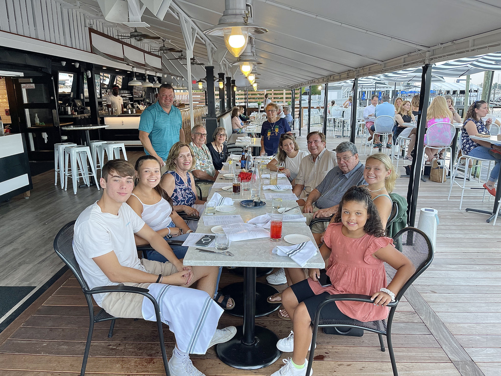 Anthony, bill & Belinda's son, standing; ?, Riley, Lorraine, Chris Binns, Elaine Binns, Belinda (standing), Anthony's girlfriend Ashley, Joh, Bill, & Anthony's 2 daughters. 2021 