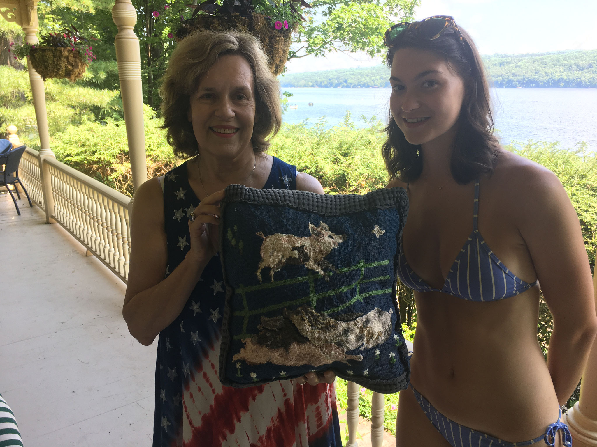 Lorraine &  Ellie with the pig needlepoint pillow Ellie made