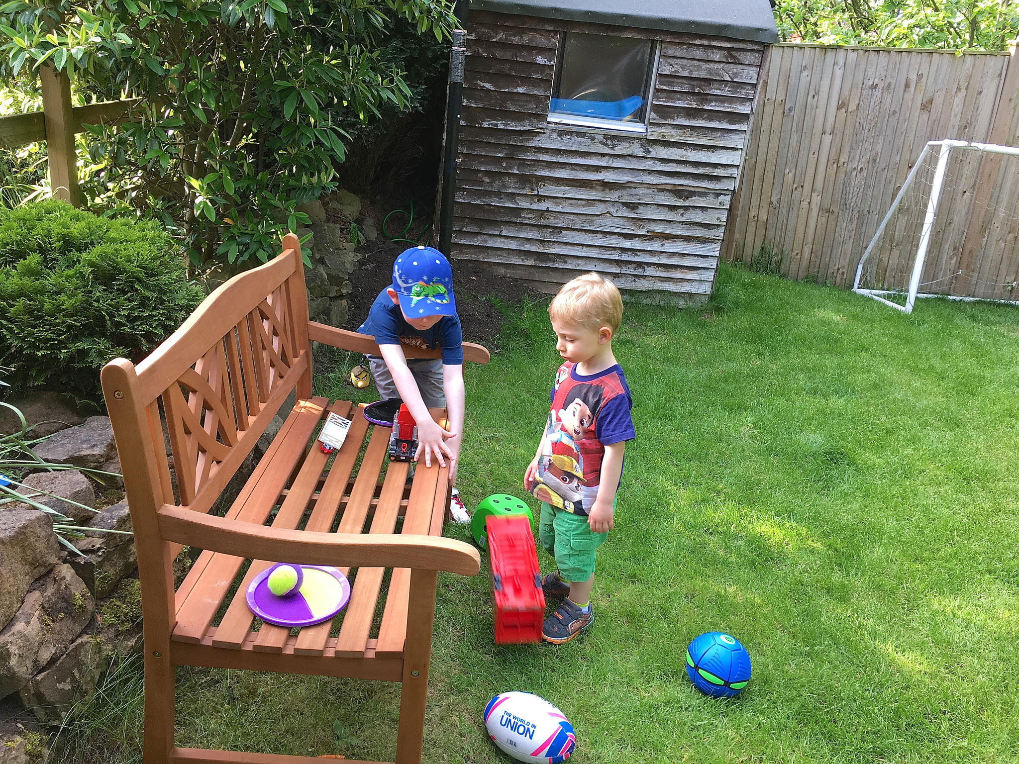 Will & Luca play in the backyard...