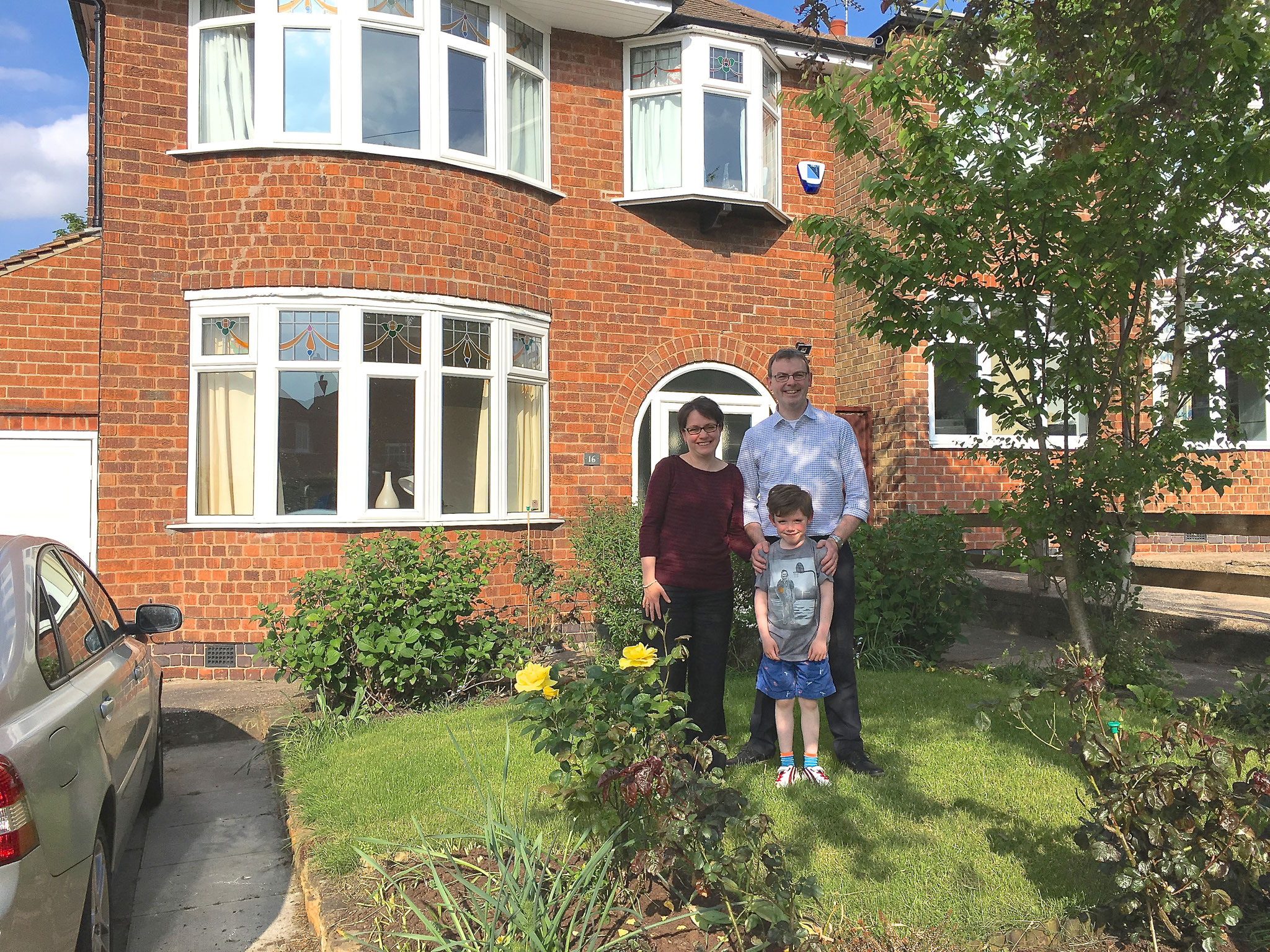 Olga, Will & Nigel in their front yard