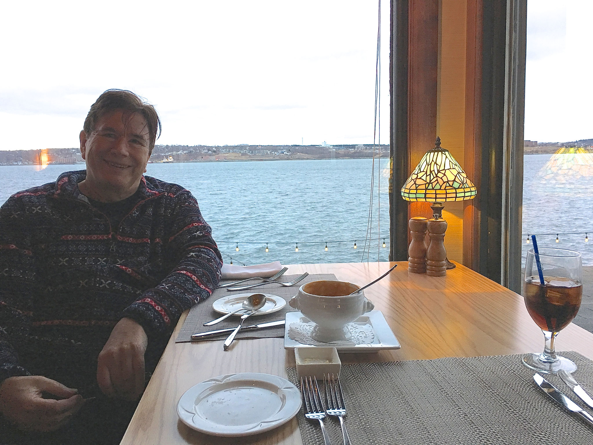 John enjoys the harbor view at Salty's in Halifax, NS, Canada