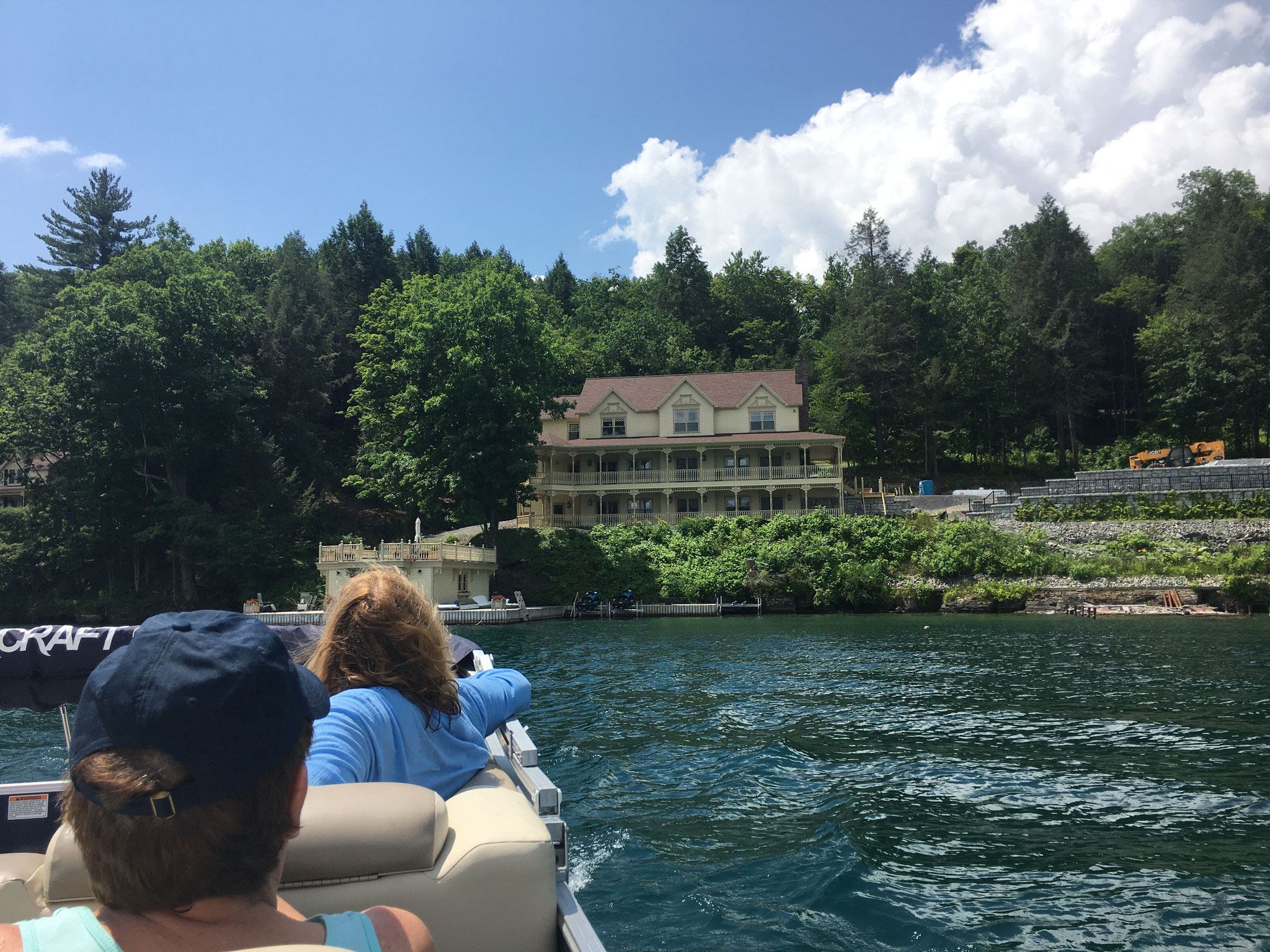 on the pontoon boat approaching the new lake house, John & Celeste, 7-2020