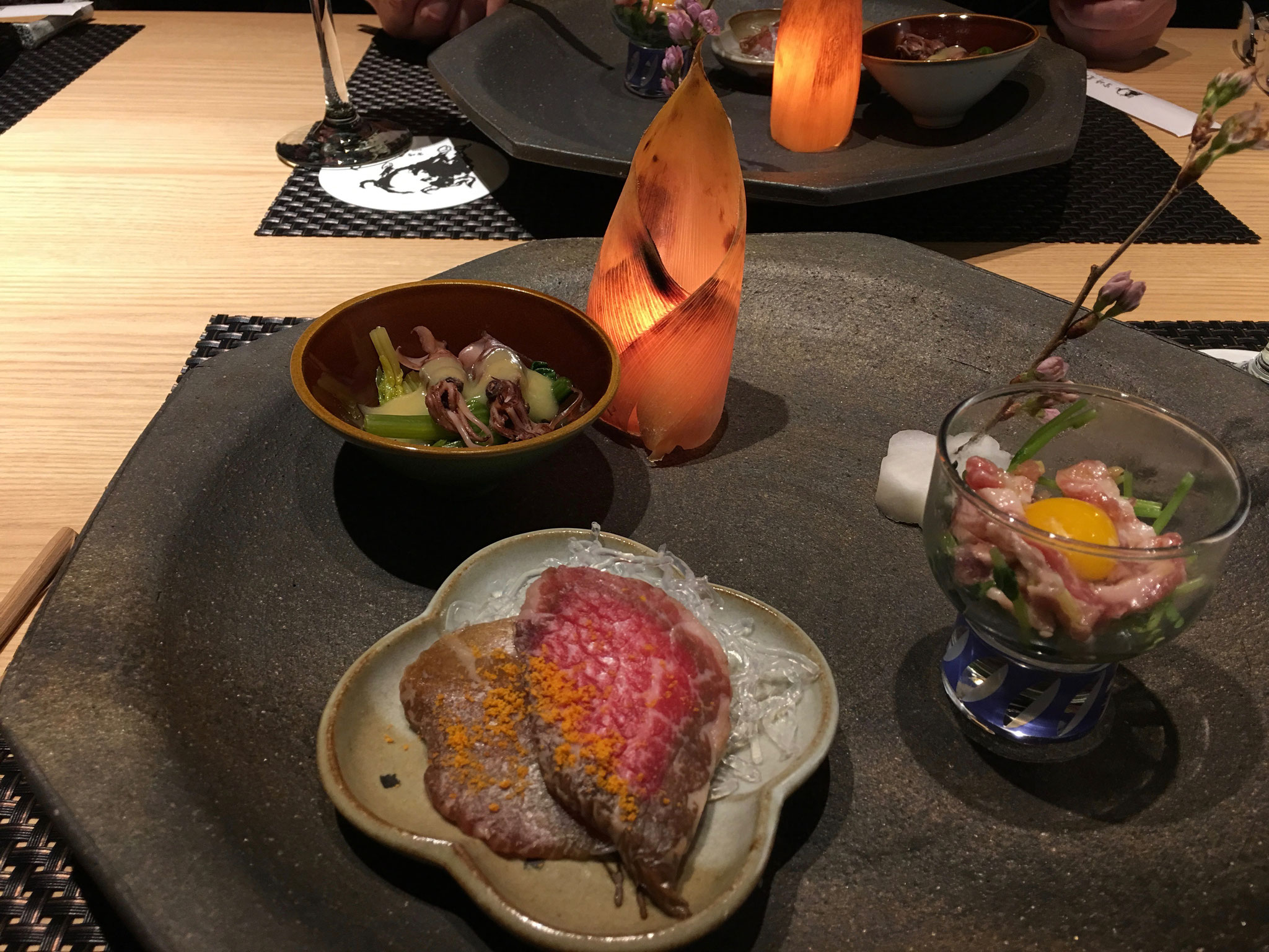 Raw beef, and baby squid at the restaurant.