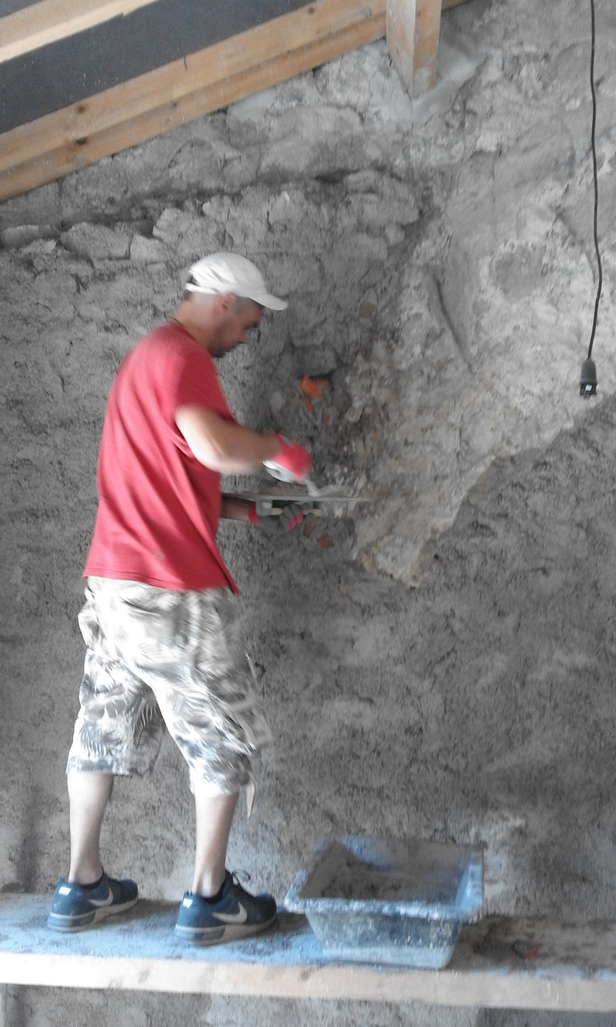 Crépir un mur de pierre