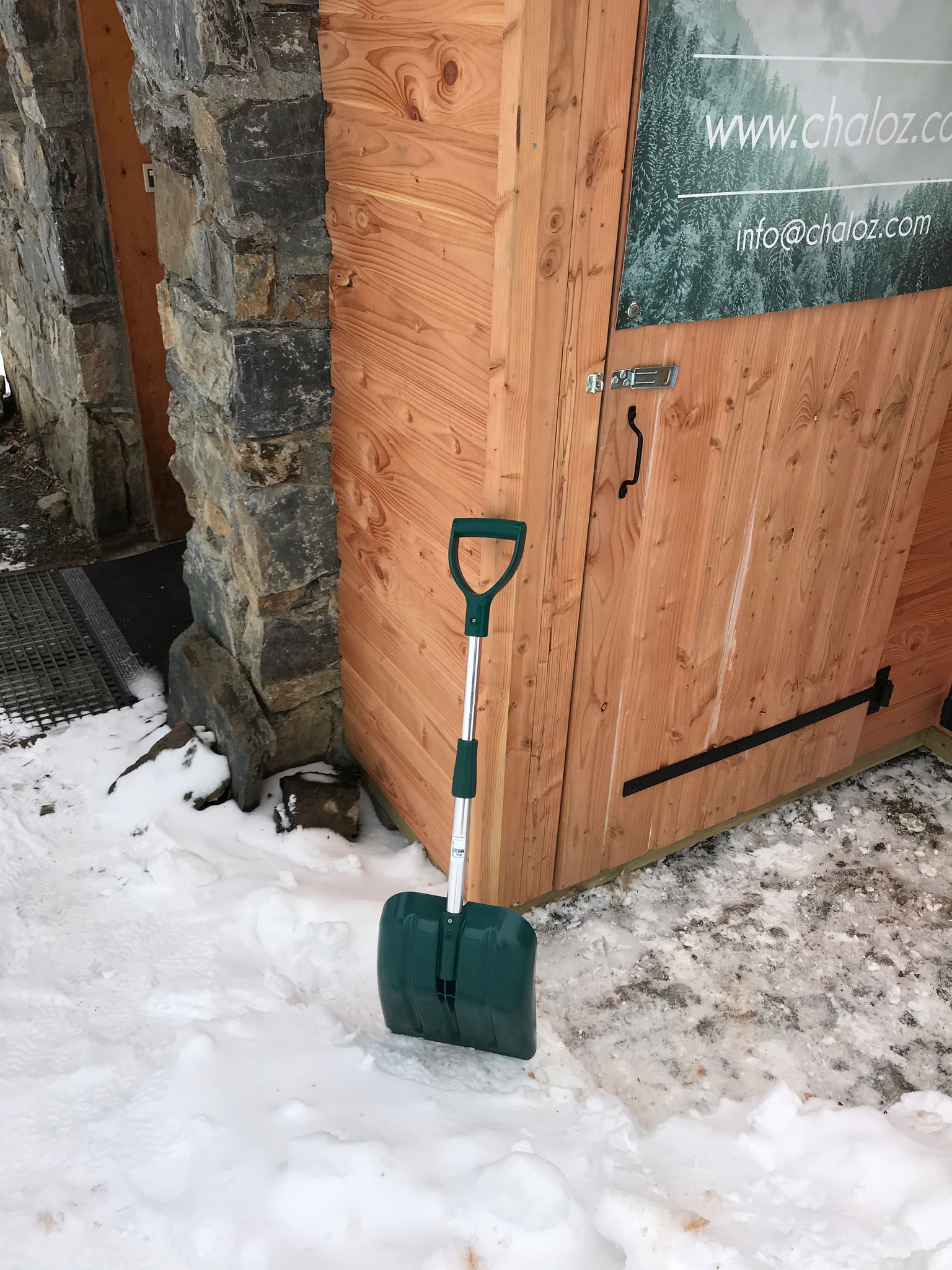 Small snow shovel inside the chalet,  if the cupboard is not accessible by snow and you need to clear the access first