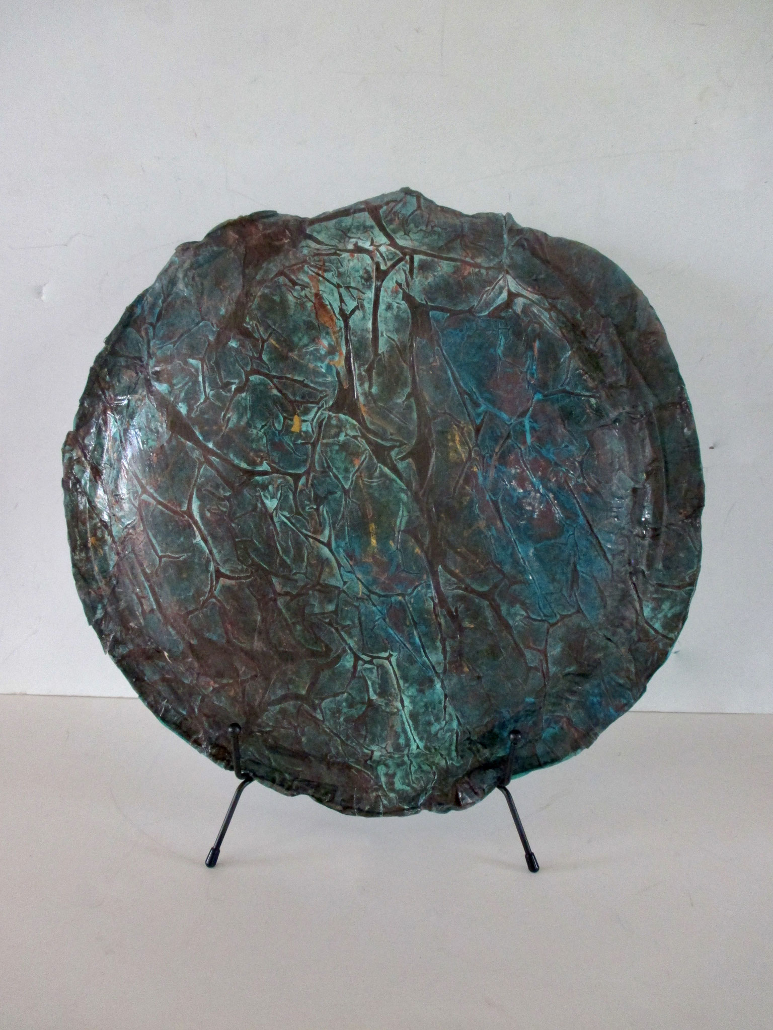 Toci (Aztec mother of Gods) 3 dimensional sculpture of cast paper and bamboo on metal stand, 13 x 13 x 2