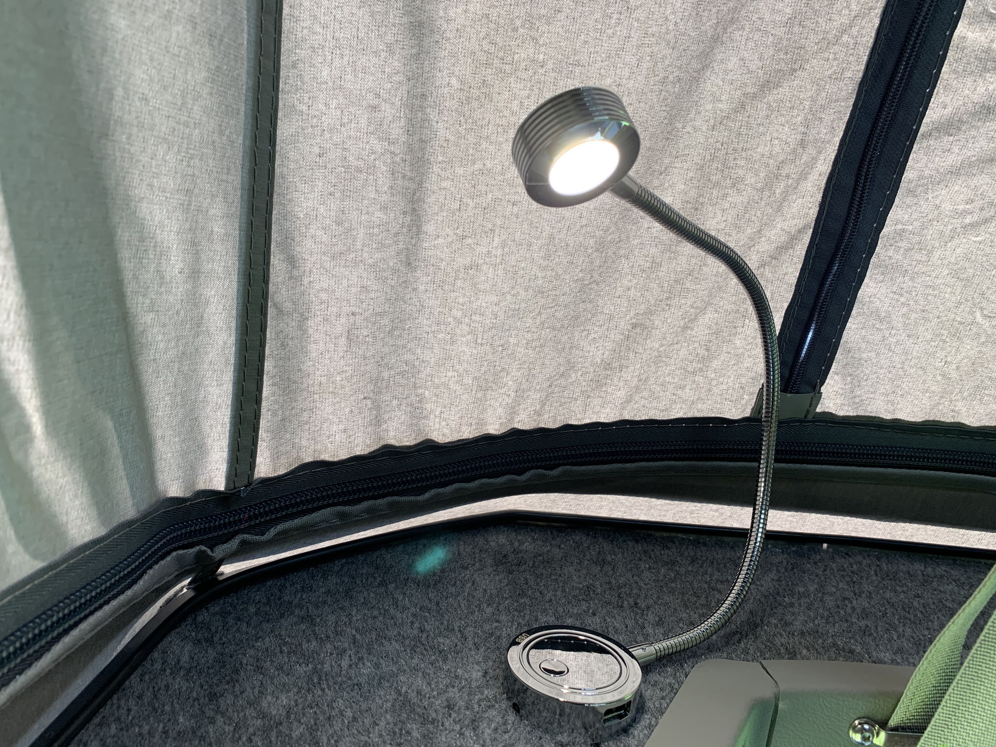 Reading light in roof with twin USB charging ports