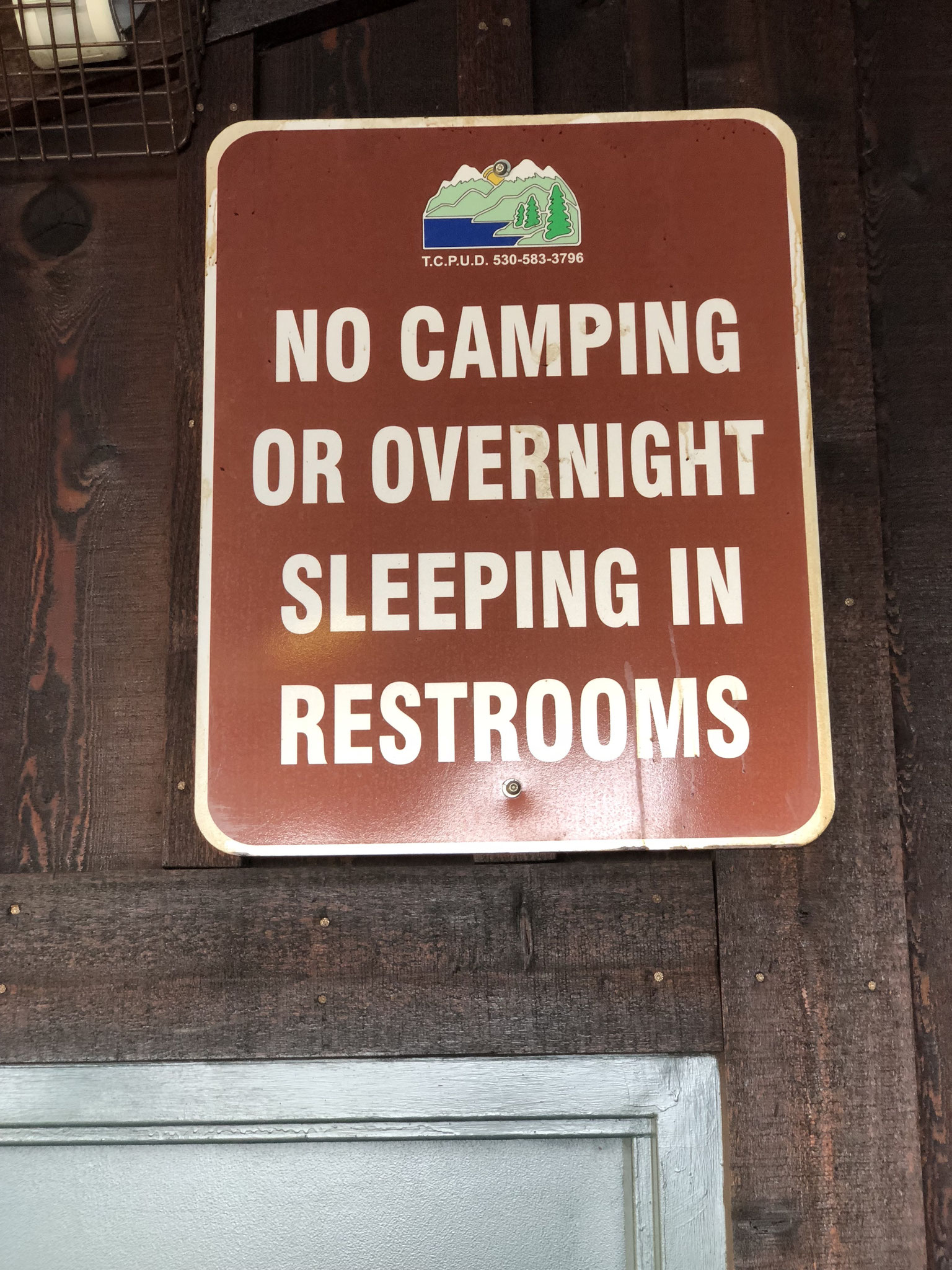 Had I not seen this sign I would have never come up with the idea of camping in a toilet